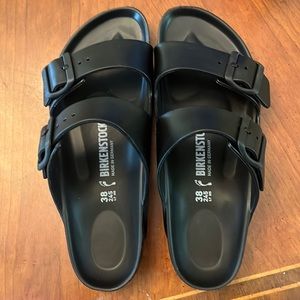 all black Birkenstocks. Never worn perfect condition. Size 7.